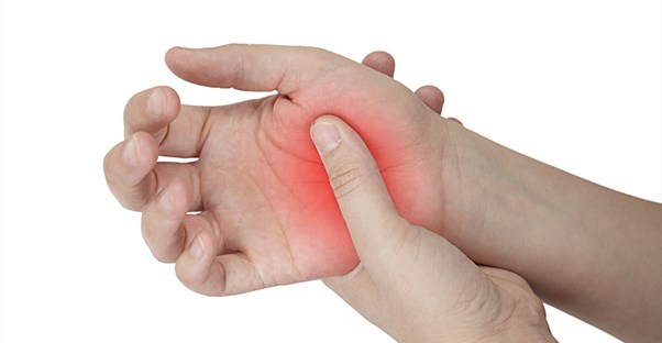 a hand is sore and red from rheumatoid arthritis