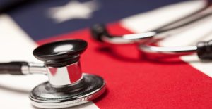 doctors stethoscope on an american flag